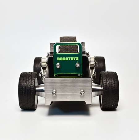 Green and silver metal roadster watch stand with black wheels, front view on white background