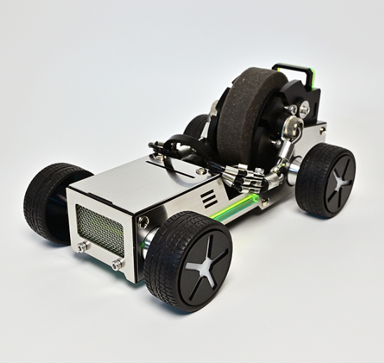 DIY robot car kit with silver chassis, green stripe, black wheels, and exposed motor components on white background