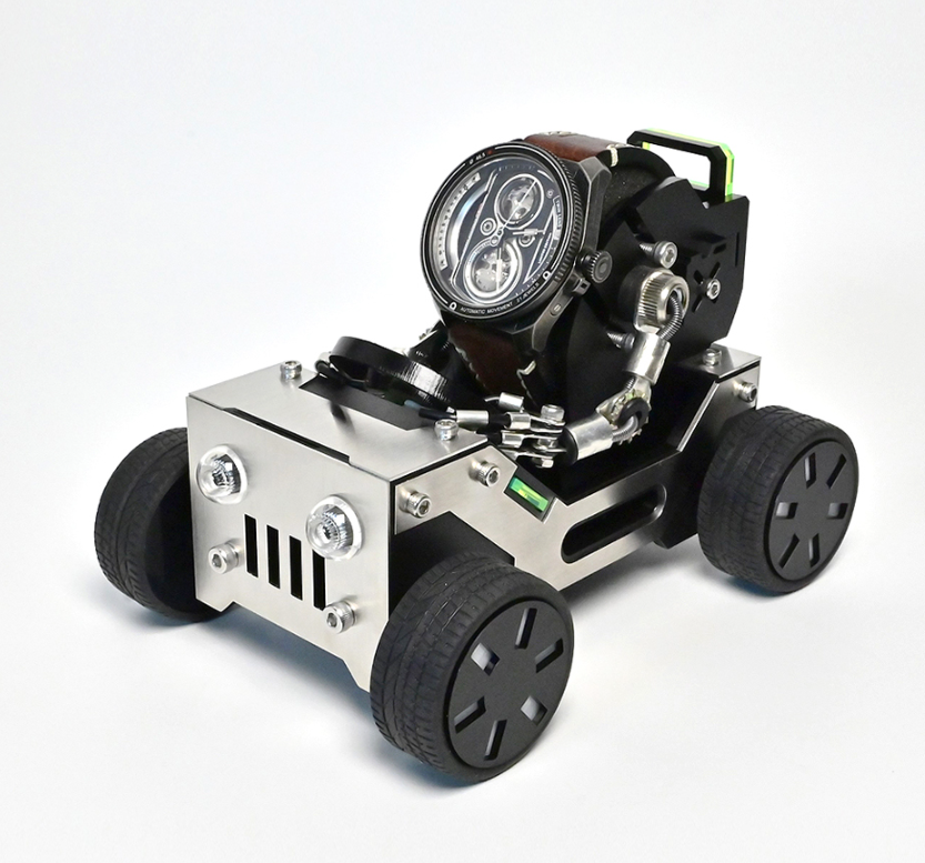 White and black off-road vehicle watch stand with oversized wheels and mounted wristwatch display holder