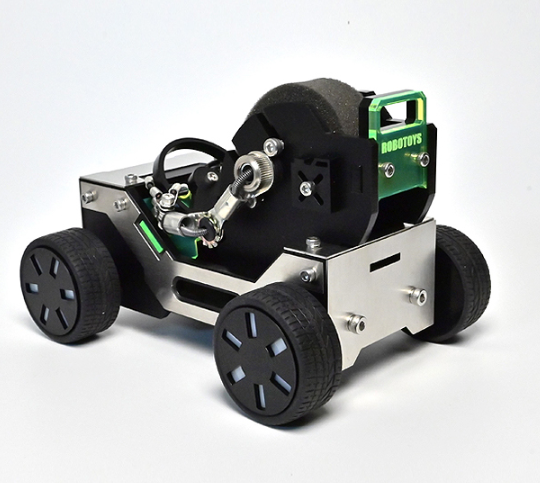 DIY robotics educational kit with green circuit board, motor assembly and black wheels on white chassis frame