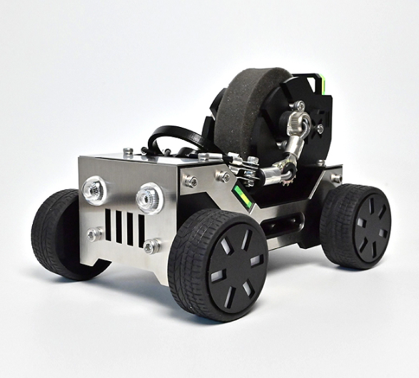 Silver and black robotic off-road vehicle toy with oversized black wheels, LED headlights, and articulated steering mechanism