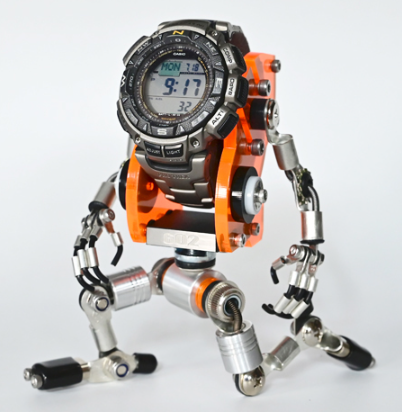 RoboMech orange and silver robotic watch stand holder with articulated arms and legs displaying digital sports watch