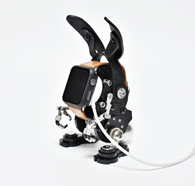 RoboRabbit black leather smartwatch stand with metal studs and charging cable holder