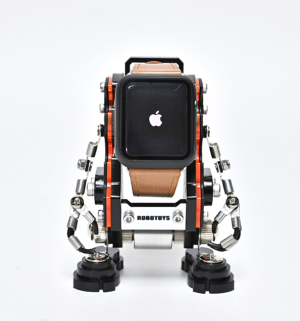 RoboToys NanoBot black smartwatch stand with articulated robotic arms holding Apple Watch with leather band