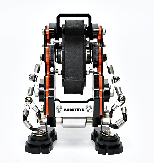 Black and orange mechanical watch stand with articulated robot arms and legs, featuring RoboToys branding and chrome accents