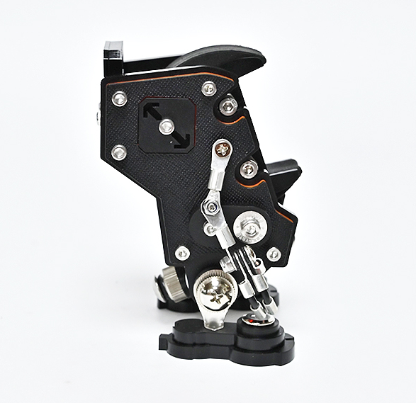 Black Saffiano leather NanoBot watch stand with chrome mechanical details and orange accents