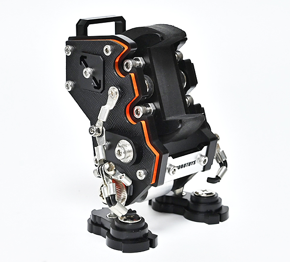 Black RoboToys NanoBot watch stand with orange accents, mechanical robot design with articulated legs and metal components