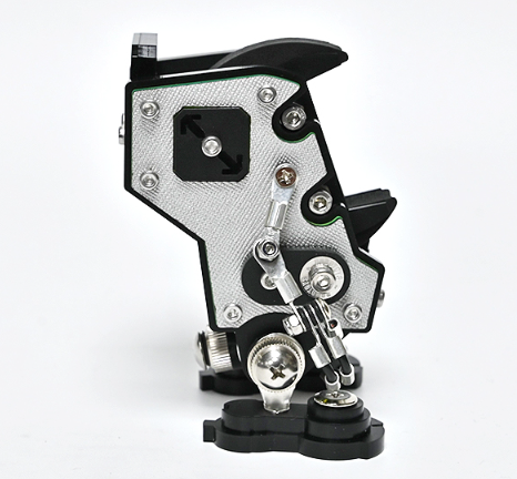 Black and silver NanoBot watch stand with mechanical design and articulated arms holding timepiece display