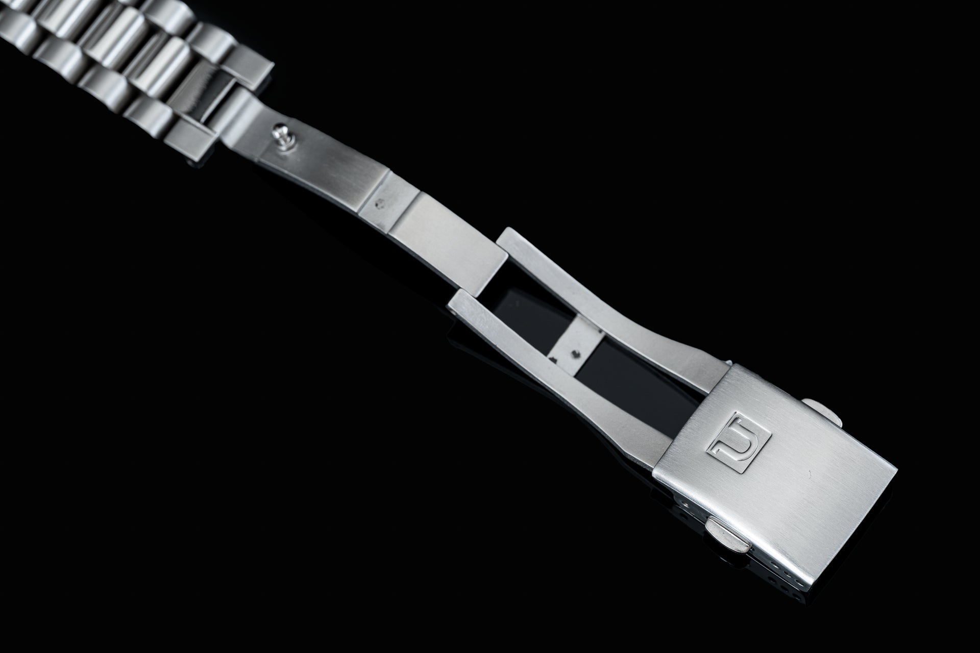 Stainless steel Uncle Lincoln bracelet with metal links and numbered clasp for Seiko 5 SNXS watch