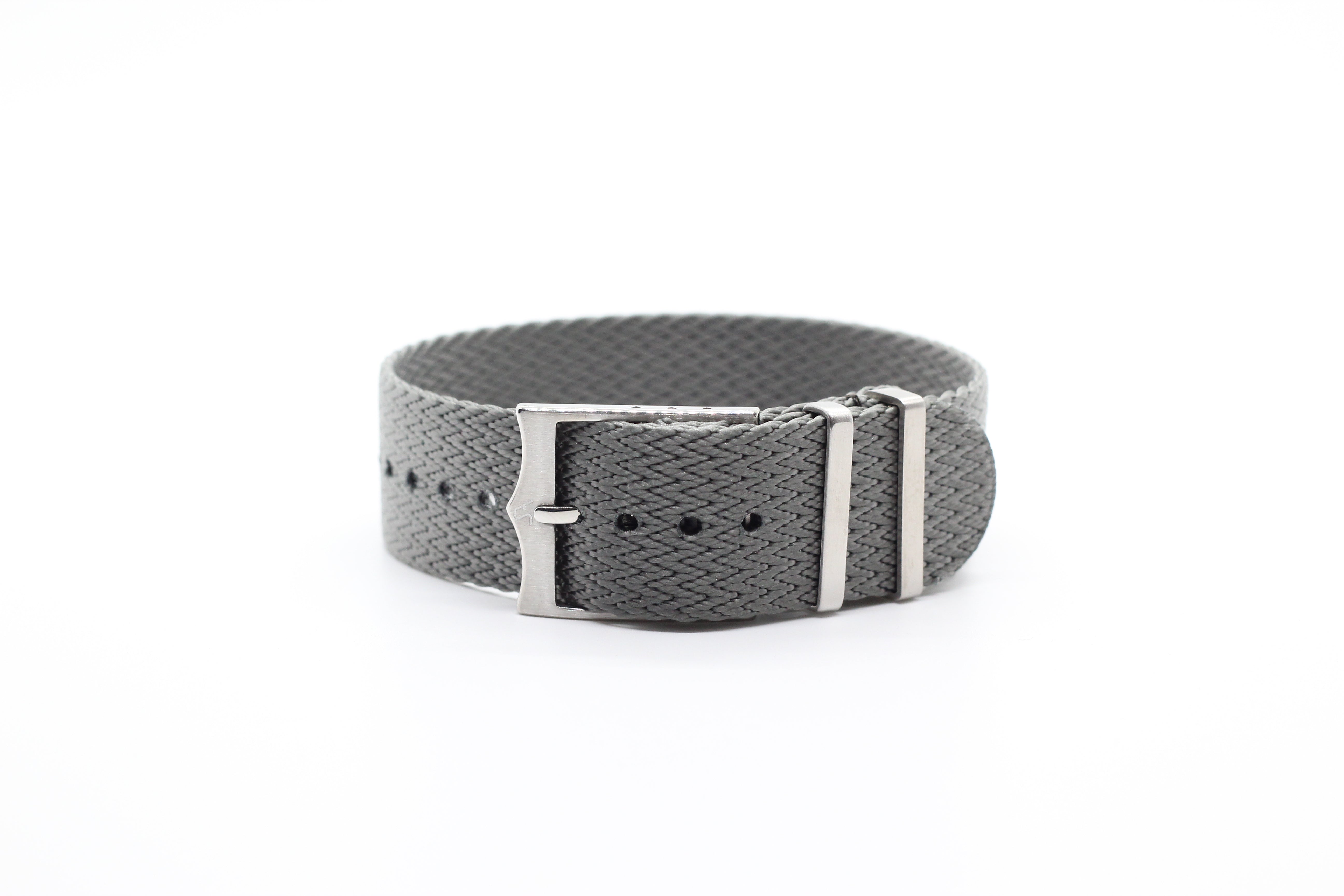 Grey fabric military-style watch strap with adjustable buckle closure and perforated holes
