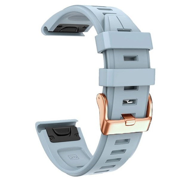 Light blue silicone smartwatch band with rose gold buckle and quick-fit connector, 20mm width, replaceable strap