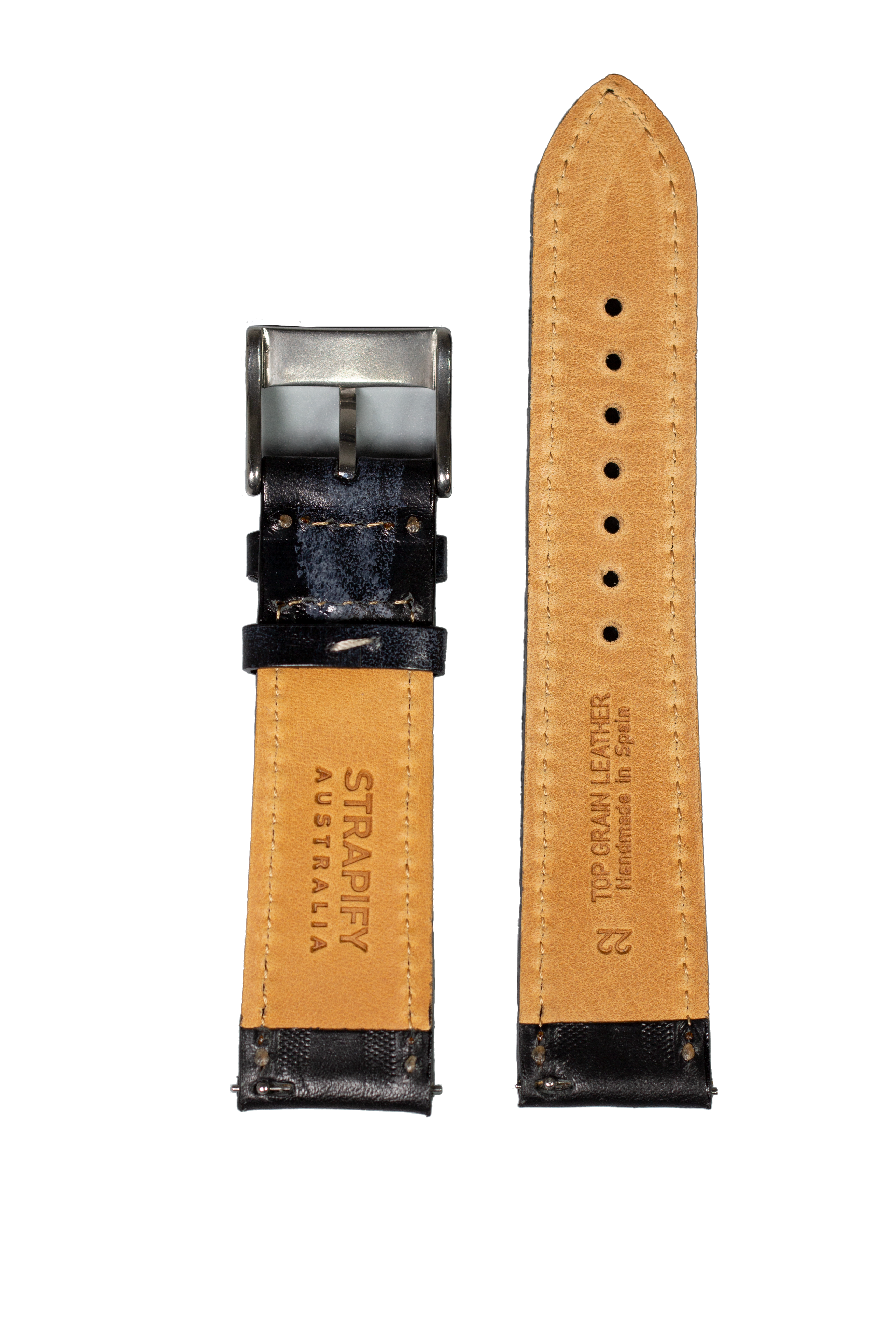 Tan leather watch strap with black contrast stitching, silver buckle, and quick release pins, 24mm width