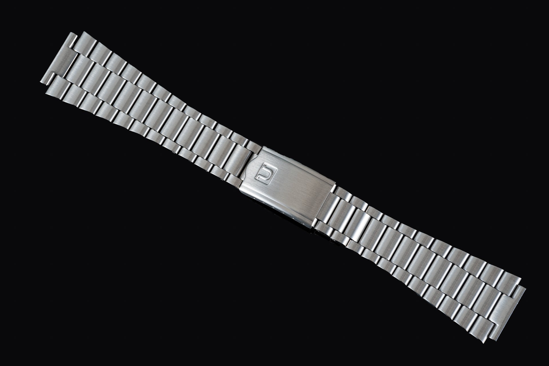 Polished stainless steel watch bracelet with solid links and brushed center clasp compatible with Omega Speedmaster Mark II