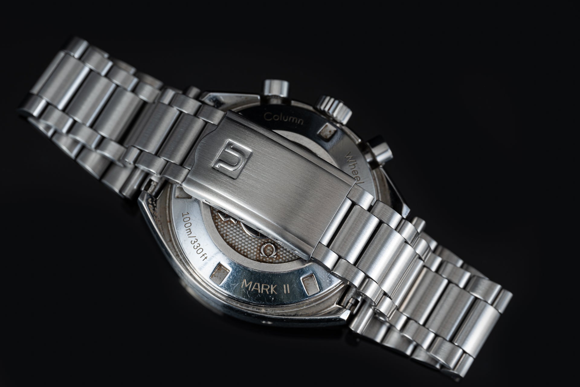 Stainless steel chronograph watch with brushed bracelet, 100m water resistance, Mark II model displayed on black background