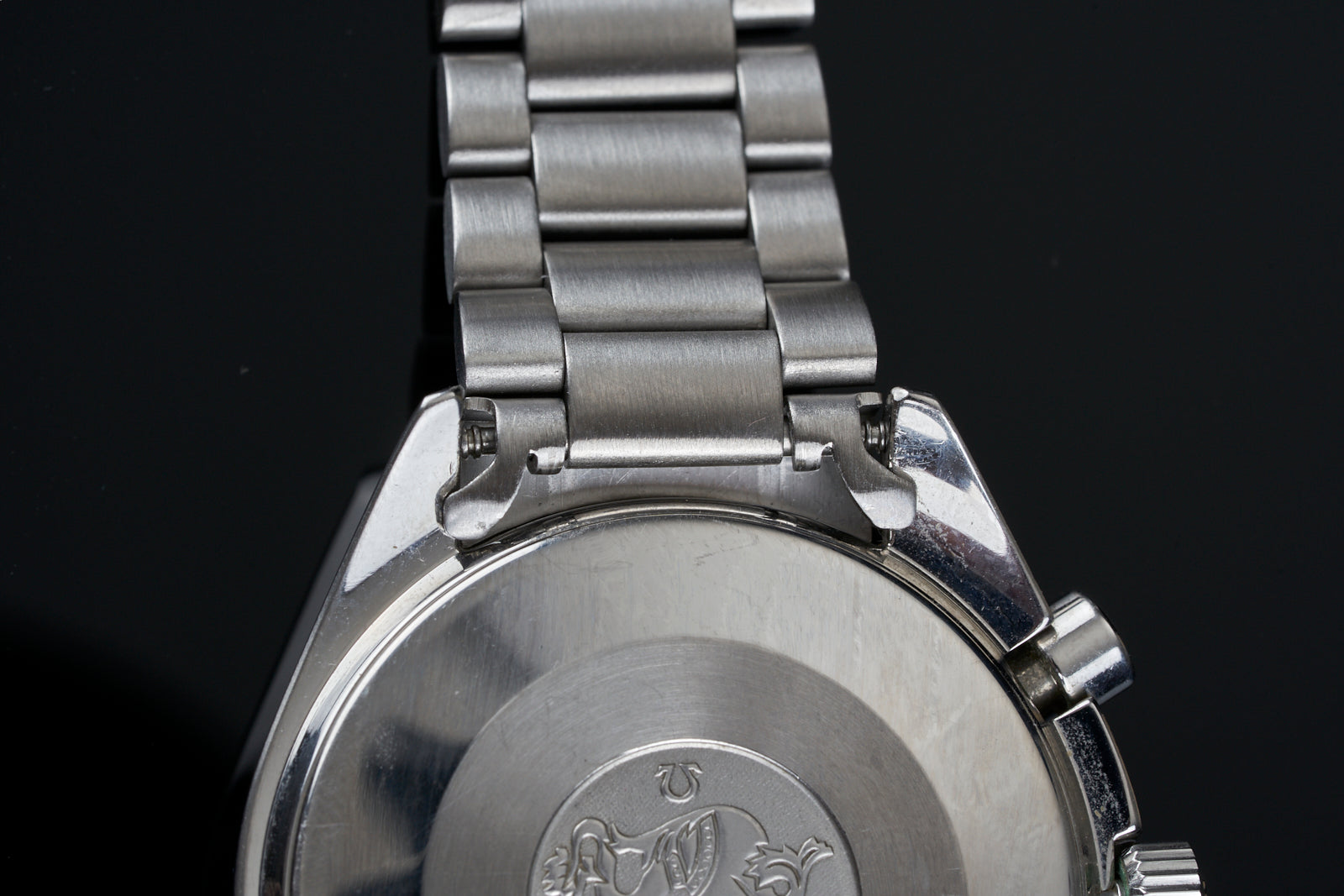 Stainless steel watch bracelet with polished links and integrated end links for Omega Speedmaster Reduced chronograph