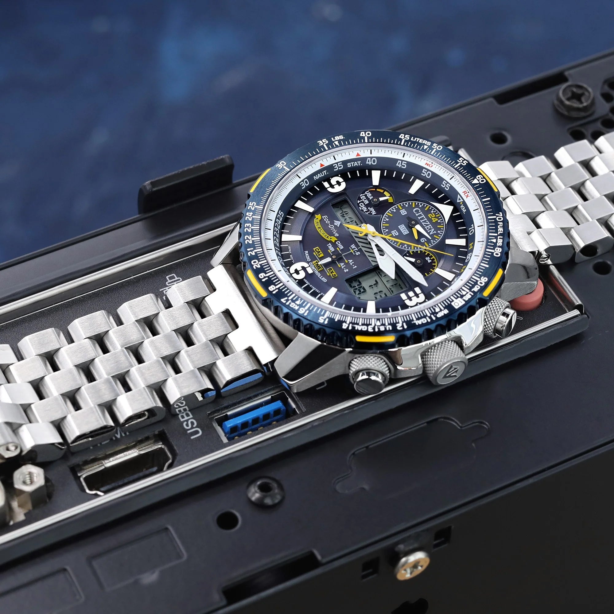 Strapcode Engineer Bracelet with V-Clasp on stainless steel watch with blue dial and yellow accents