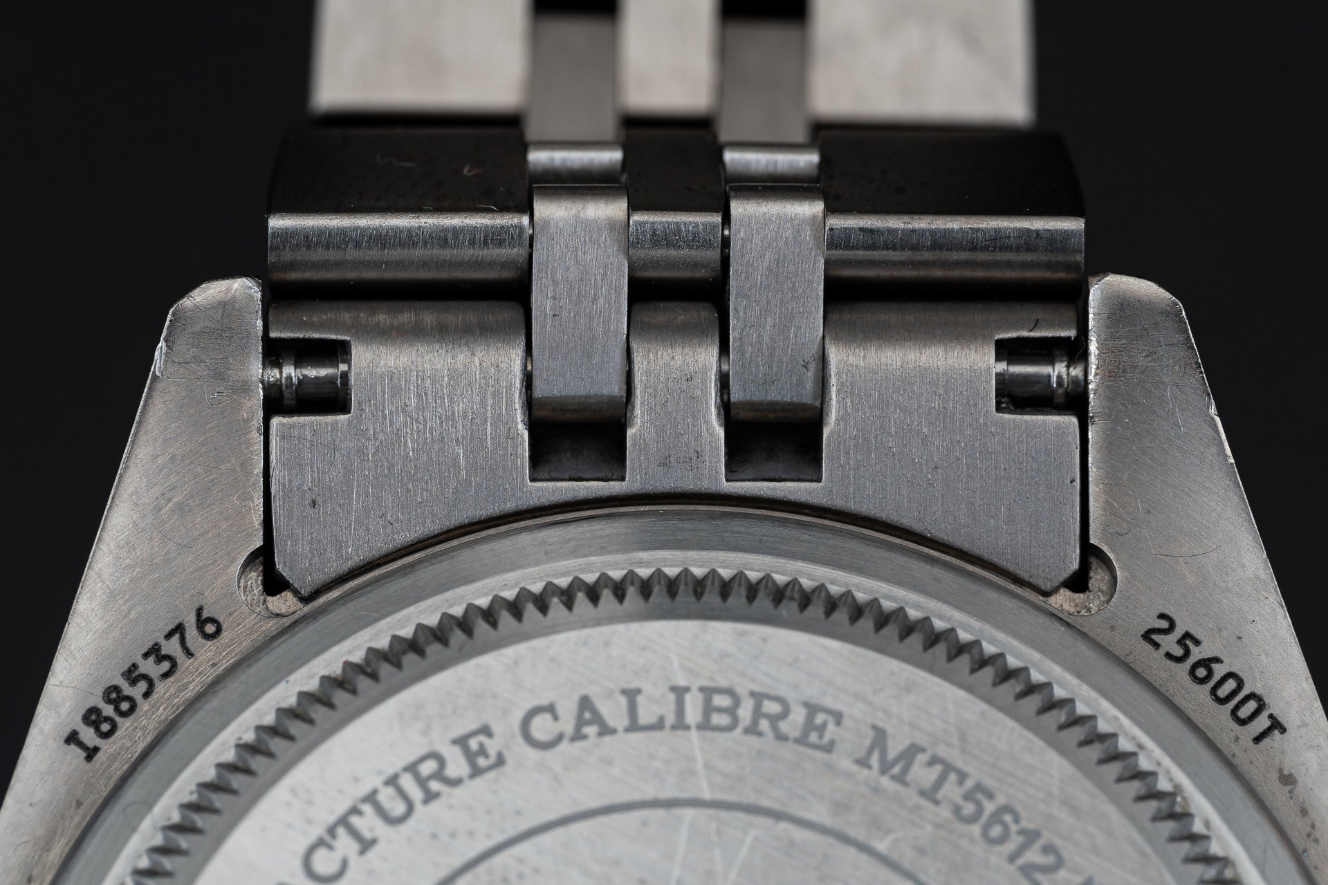 Titanium bracelet end link with integrated clasp mechanism for Tudor Pelagos 42mm watch, showing brushed metal finish and deployment clasp detail