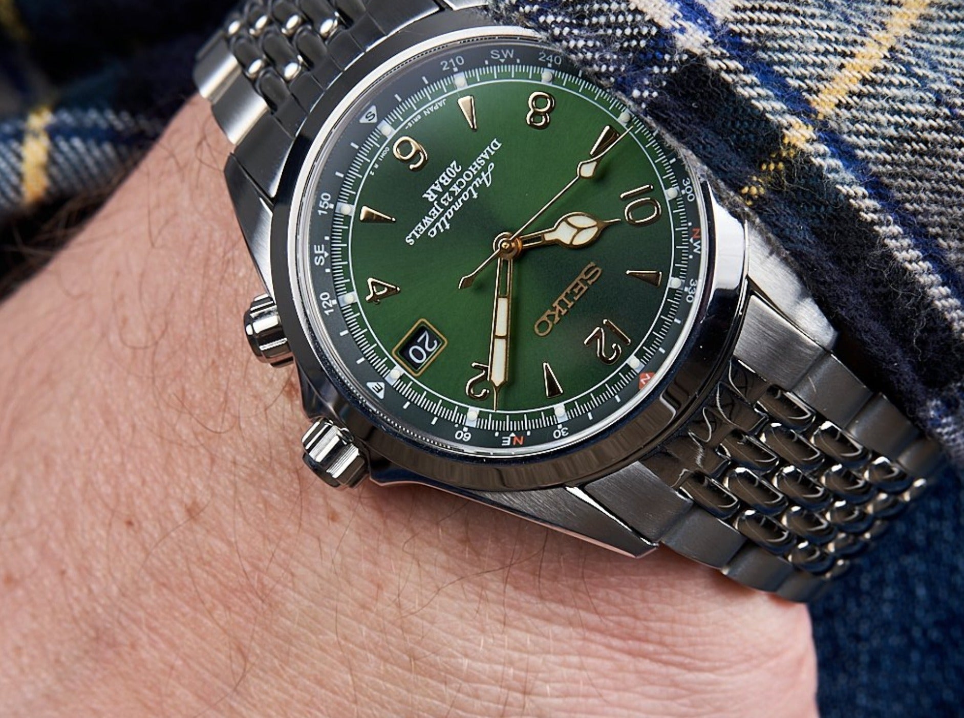 Seiko Prospex Stainless Steel Watch with Green Dial on Beads of Rice Bracelet worn on wrist