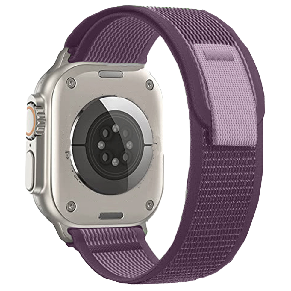 Apple Watch with purple Trail Loop band, titanium case, digital crown, and optical heart rate sensor visible