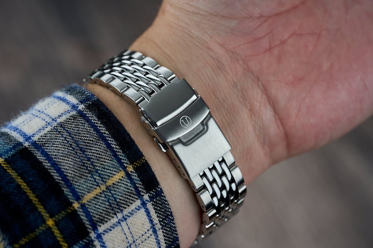 Stainless steel beads of rice watch bracelet on wrist with brushed and polished finish links