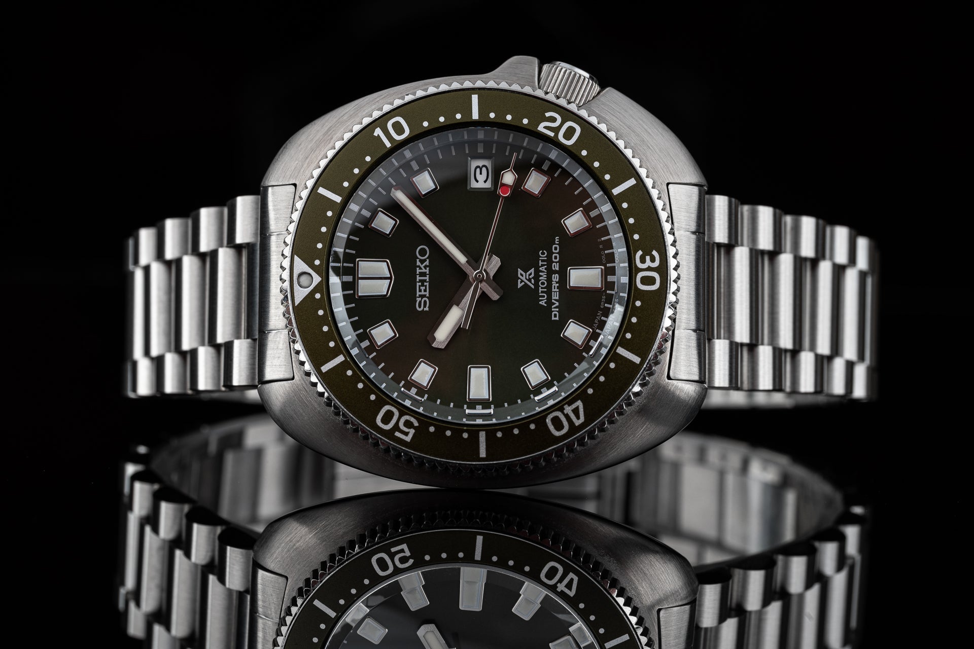 Seiko SPB15x Willard automatic dive watch with stainless steel bracelet, black dial, rotating bezel, and luminous hour markers