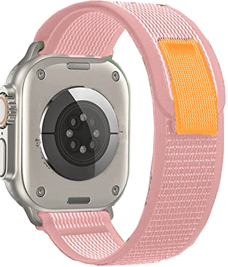 Apple Watch with pink and yellow Trail Loop band, titanium case, digital watch face with fitness tracking capabilities