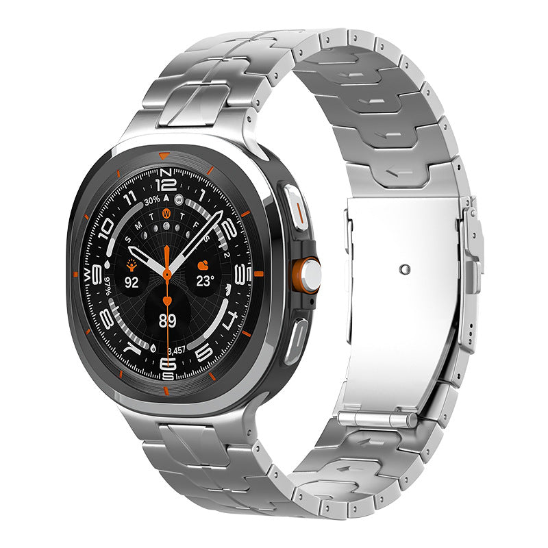 Titanium smartwatch with black dial, orange accents, and metal bracelet band shown front and back view