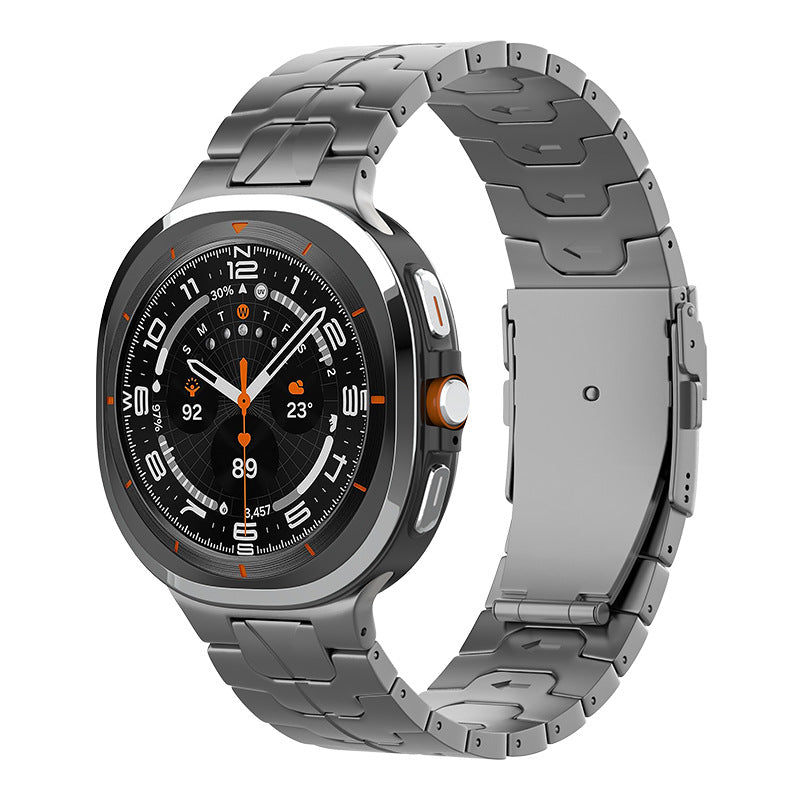 Titanium smartwatch with black dial, orange accents, and matching metal bracelet band showing front and side views