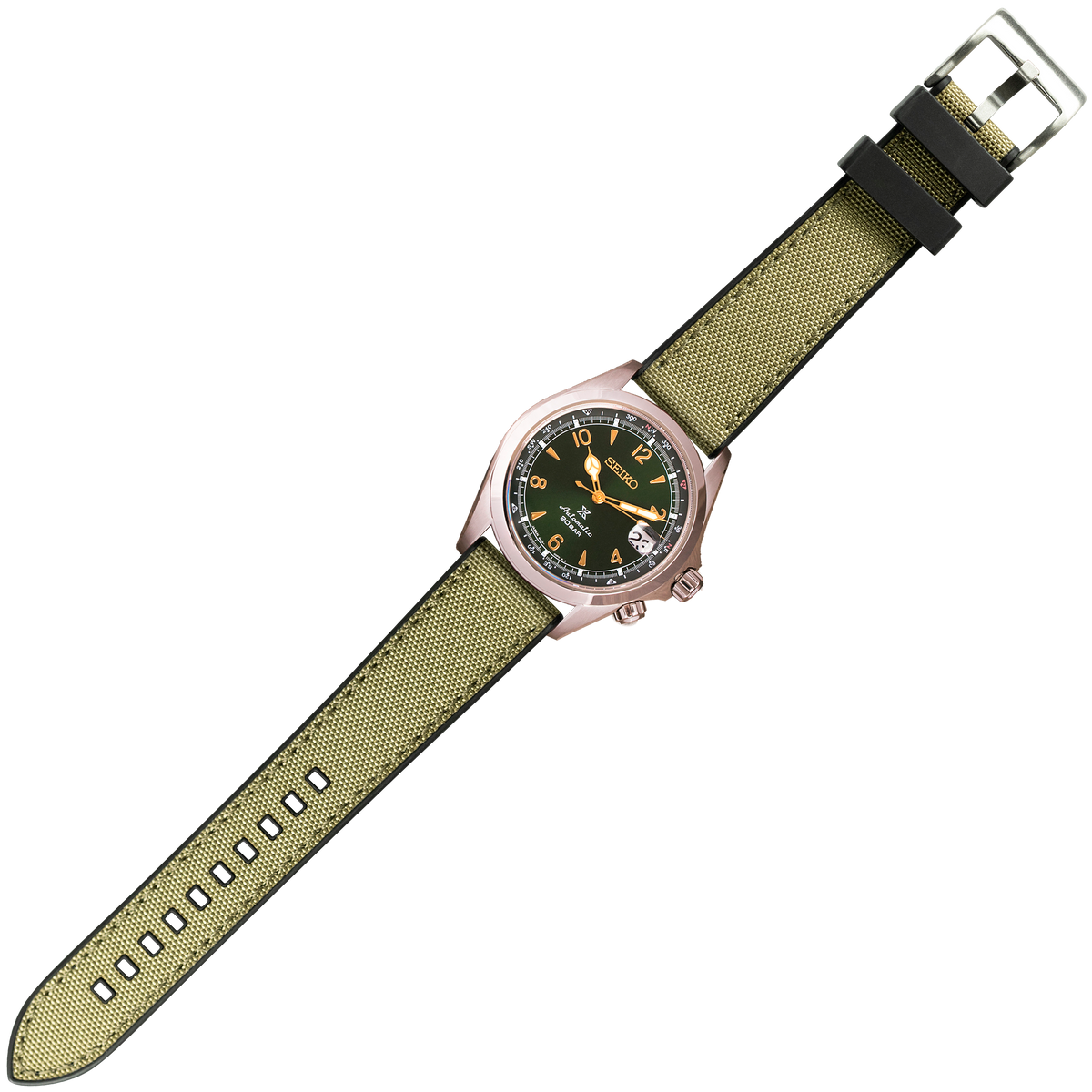 Seiko field watch with rose gold case, black dial with gold indices, date window, and green canvas fabric strap with black rubber keeper