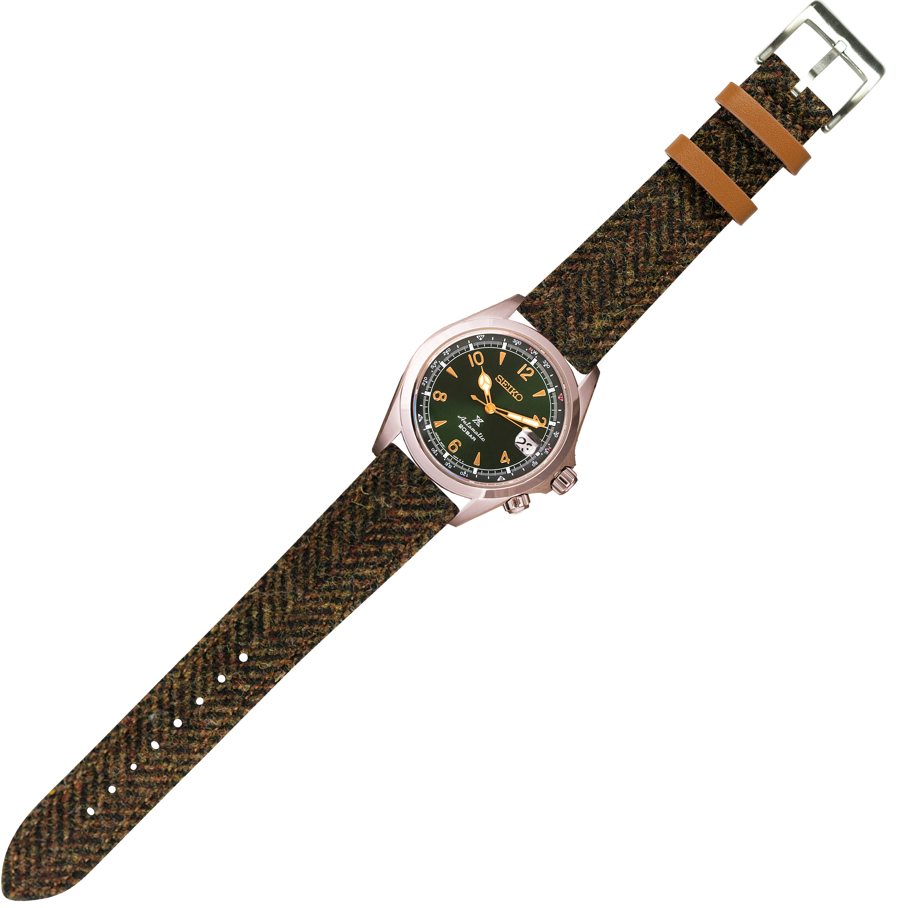 Seiko watch with stainless steel case and black dial on brown Harris Tweed herringbone quick release strap with tan leather keepers