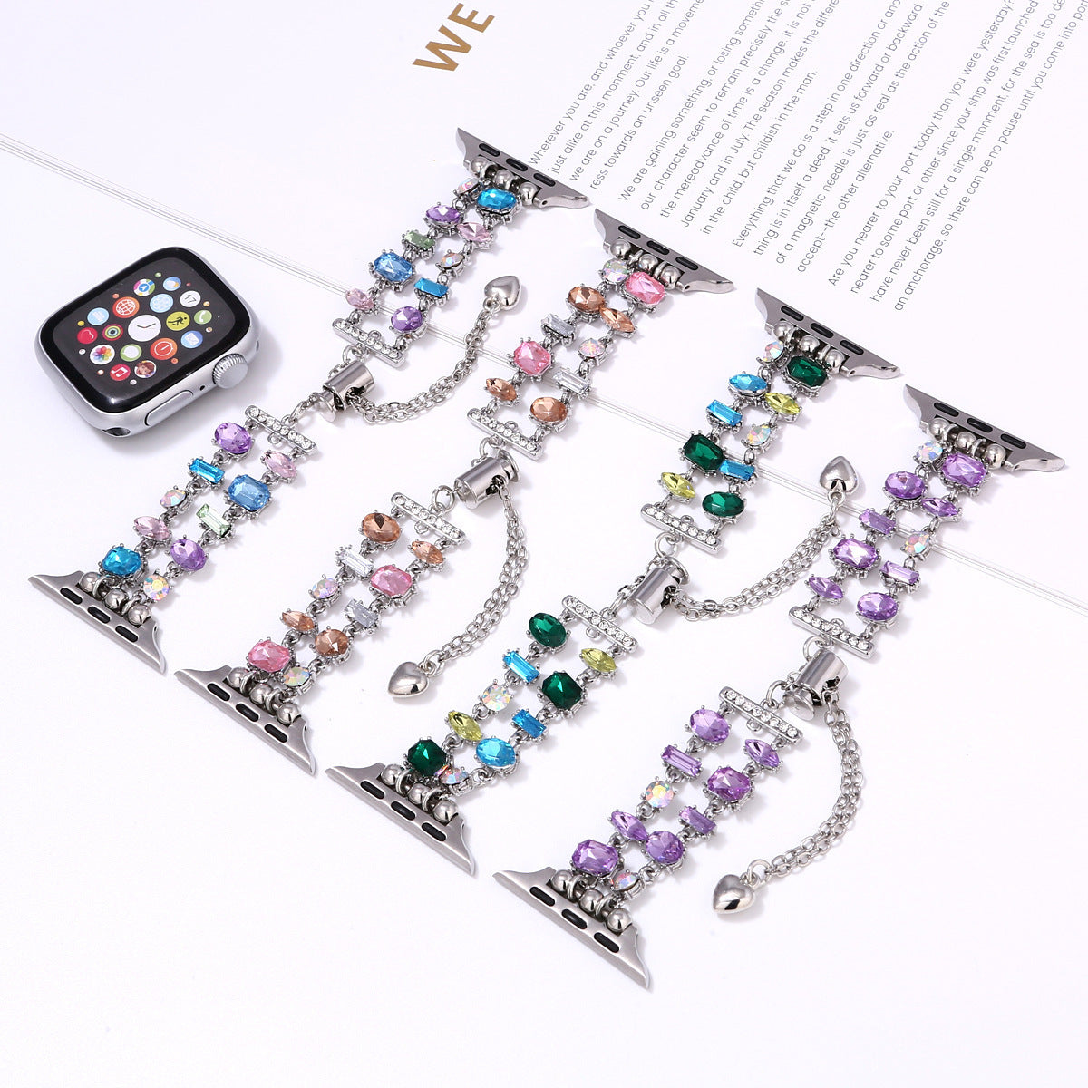 Colorful crystal beaded smartwatch bands with multicolor cubic zirconia stones in purple, blue, pink, and green featuring silver metal connectors