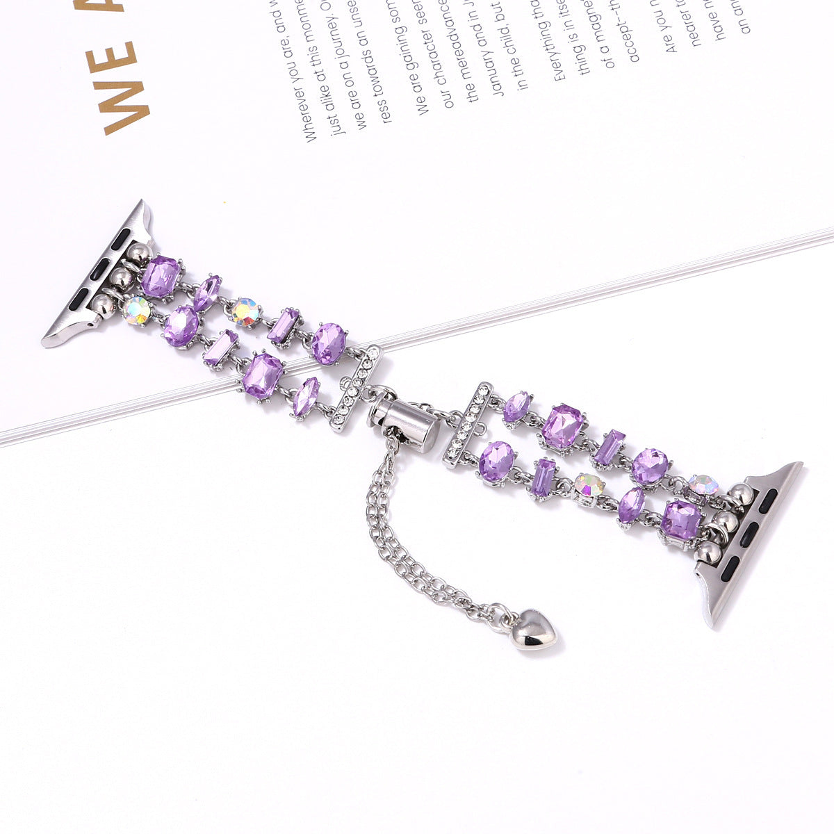 Purple crystal and rhinestone smartwatch band with silver metal connectors and charm pendant
