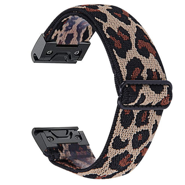 Leopard print quickfit watch band with black metal connectors and woven gaucho weave fabric design