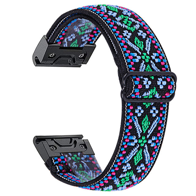 Colorful QuickFit Gaucho Weave smartwatch band with vibrant geometric pattern, black quick-release connectors