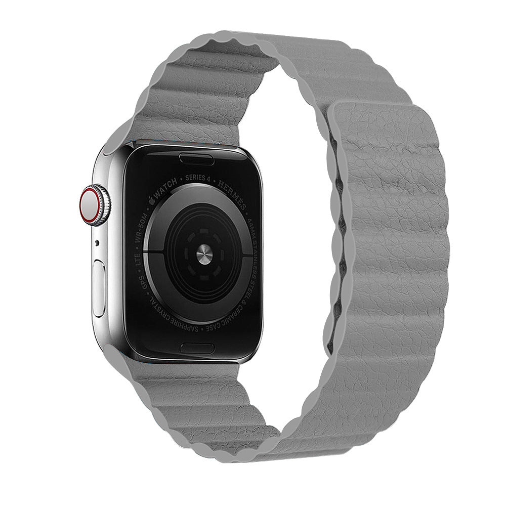 Silver stainless steel smartwatch with gray quilted leather loop band and red digital crown