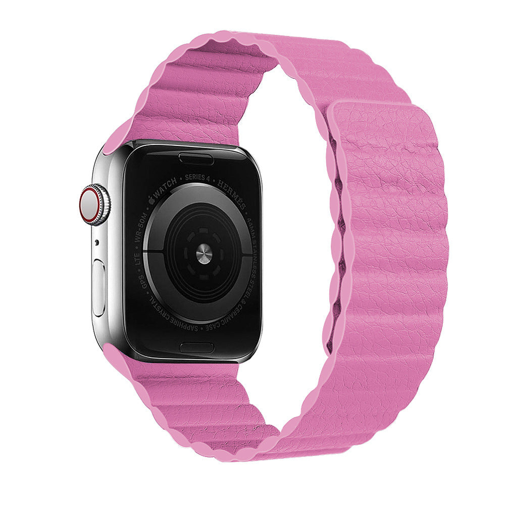 Silver stainless steel smartwatch with pink quilted leather loop band and red digital crown