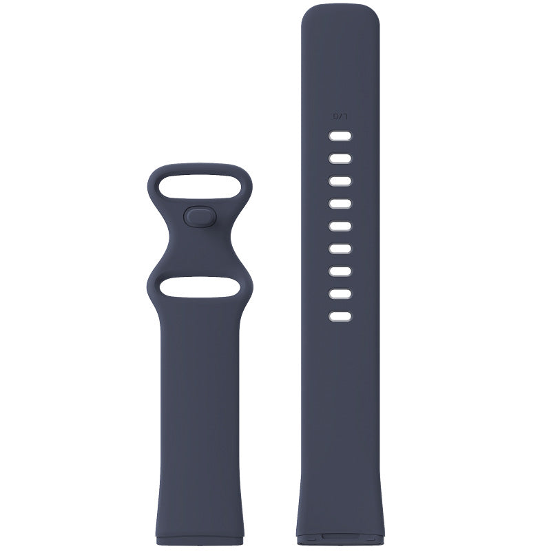 Navy blue silicone watch band with ventilation holes for Fitbit Versa and Sense smartwatches, shown with connector piece