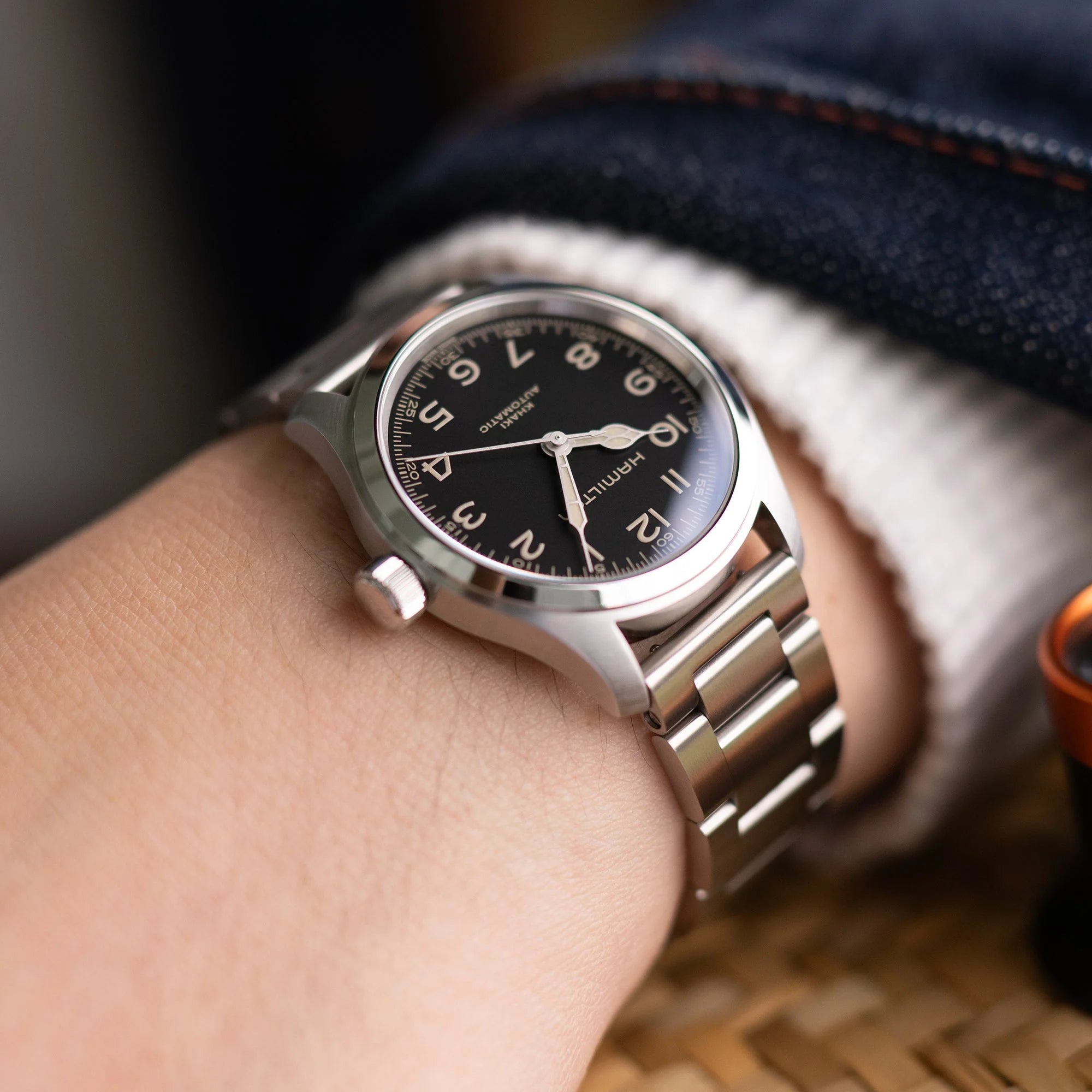 Titanium Super-O2 quick release watch bracelet with pull-twist mechanism on stainless steel sports watch with black dial