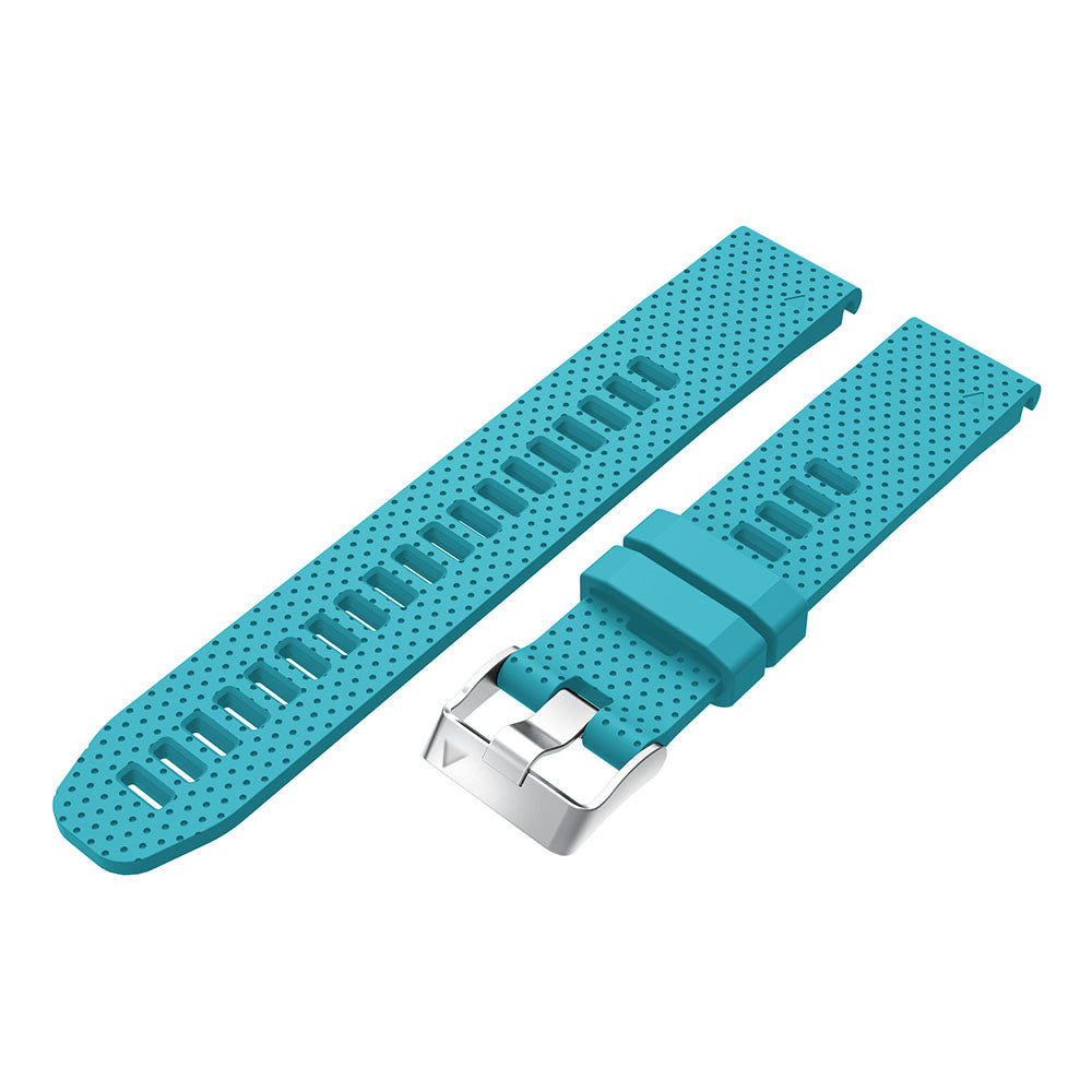 Turquoise perforated silicone smartwatch band with silver buckle hardware and quick-fit connector bars