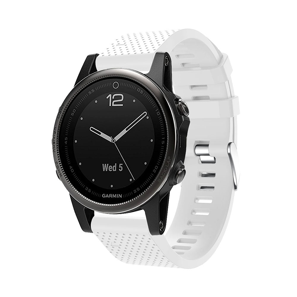 Garmin smartwatch with black dial, white silicone band, silver hardware and QuickFit 20mm strap system