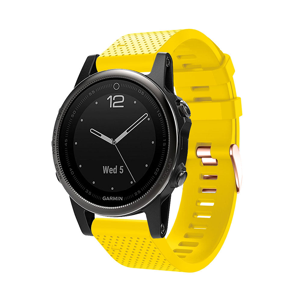 Black and yellow Garmin smartwatch with QuickFit silicone band and rose gold hardware
