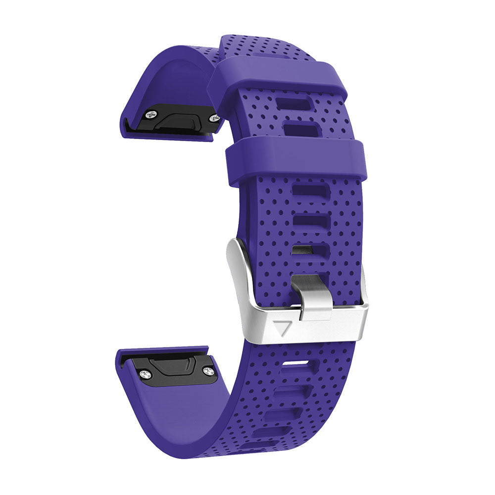 Purple silicone smartwatch band with perforated design, silver buckle hardware, and quick-release connector for fitness tracking watches
