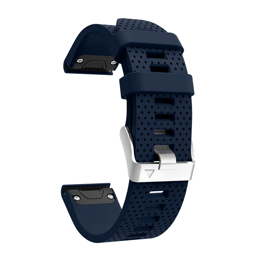 Navy silicone smartwatch band with perforated design, silver buckle hardware, and quick-fit 20mm connector system