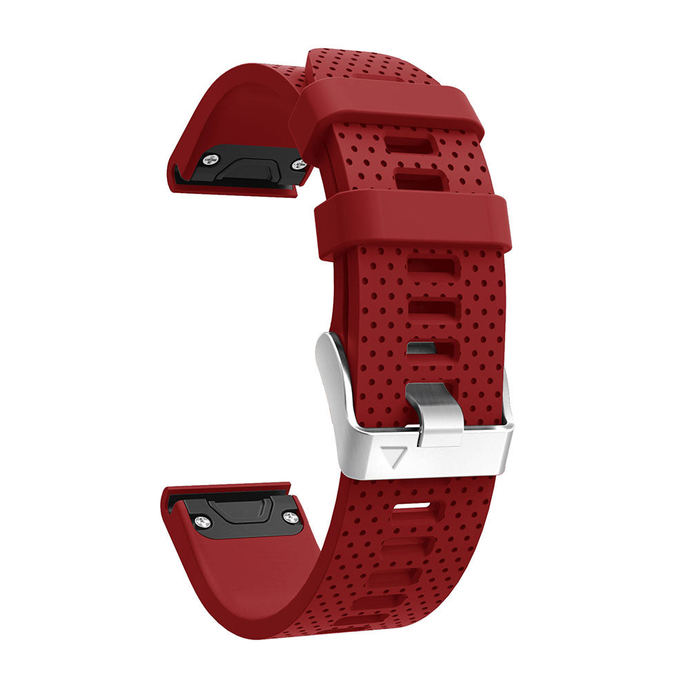 Red perforated silicone watch band with silver buckle hardware for Garmin Forerunner smartwatch
