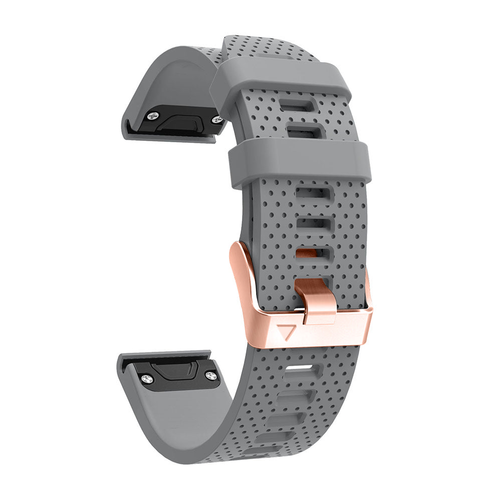 Gray perforated silicone smartwatch band with rose gold buckle, quick-fit connector, and charging port compatibility