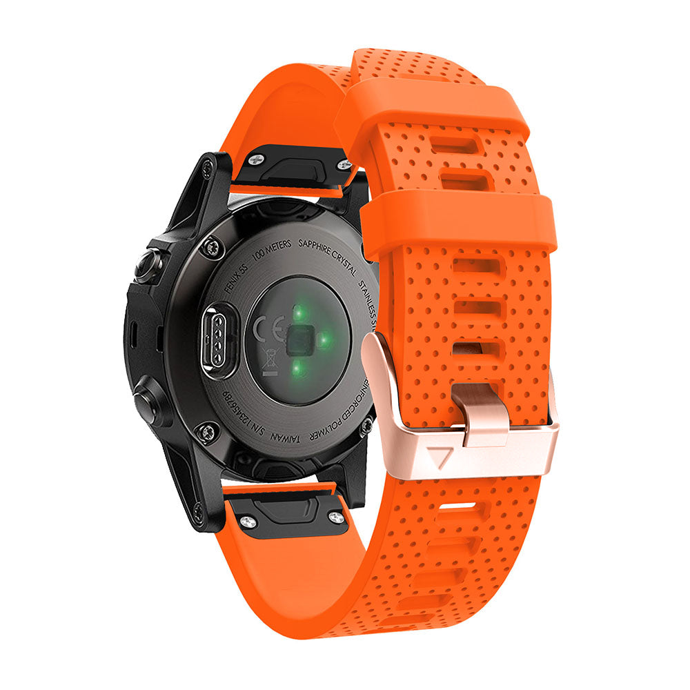 Black and orange sport smartwatch with perforated silicone band and rose gold buckle hardware, sapphire crystal display