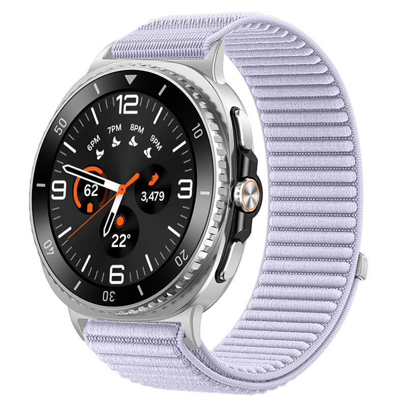 Smartwatch with black dial and silver case featuring orange accents, paired with lavender sports loop band