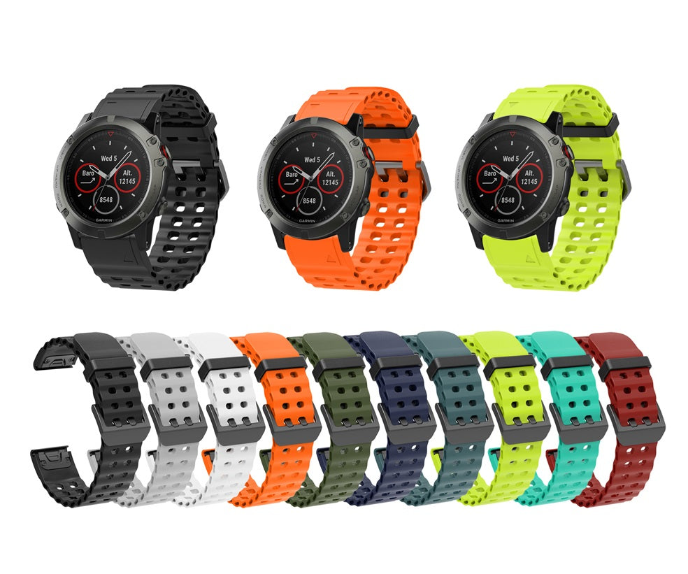 Garmin sports watch with interchangeable silicone bands in black, orange, and neon yellow, plus ten additional colorful strap options displayed below