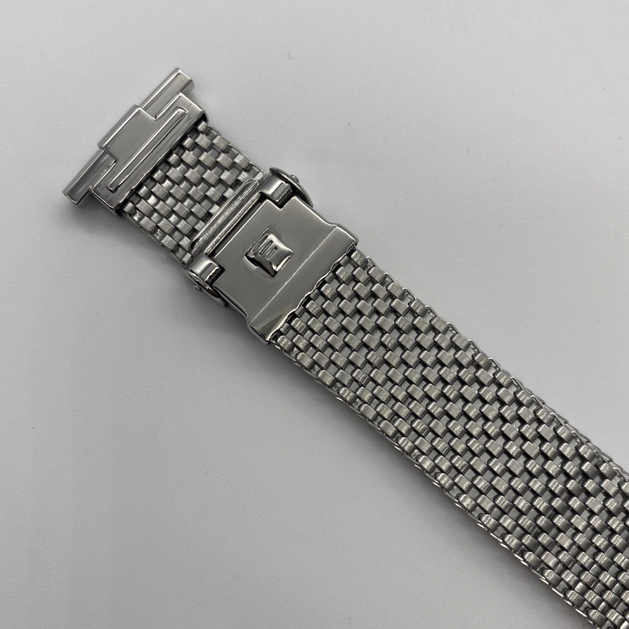 Stainless steel mesh watch bracelet with straight ends and adjustable clasp closure