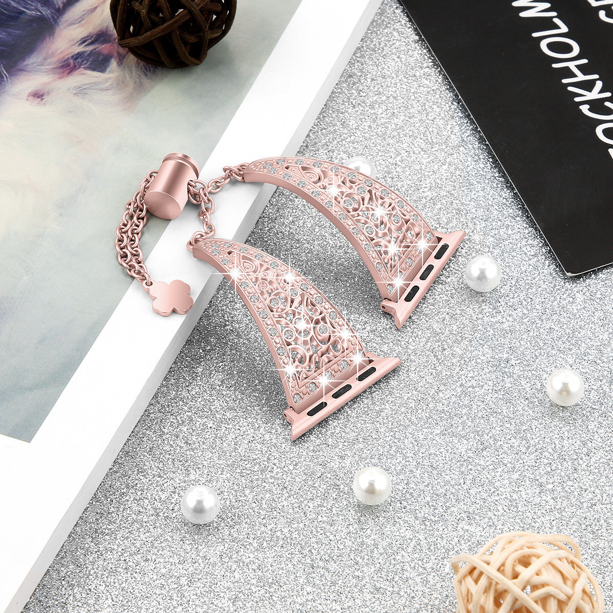 Rose gold filigree Apple Watch band with matching charm bracelet featuring ornate scrollwork design
